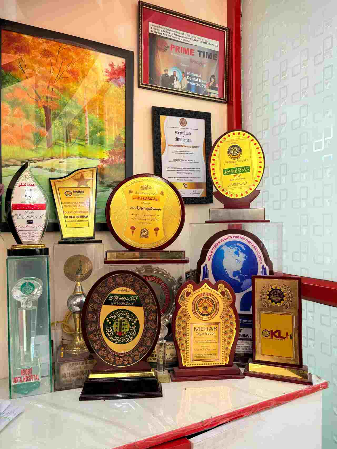 Awards, mementos and certificates received by NeoDent Dental Hospitals, on display at the hospital.